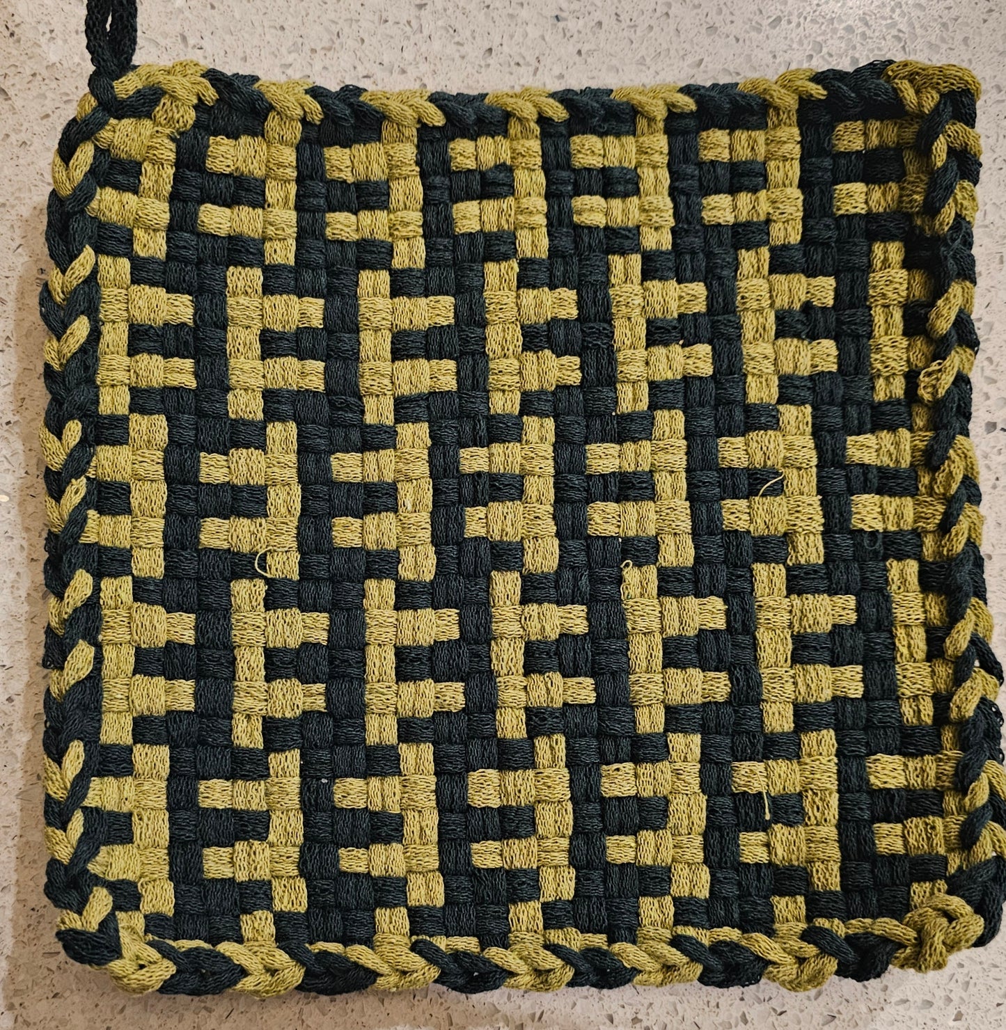 Woven green on green potholder