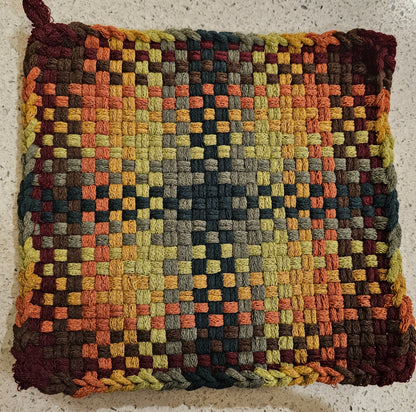 Potholder in a checkered pattern in earthy autumn tones 