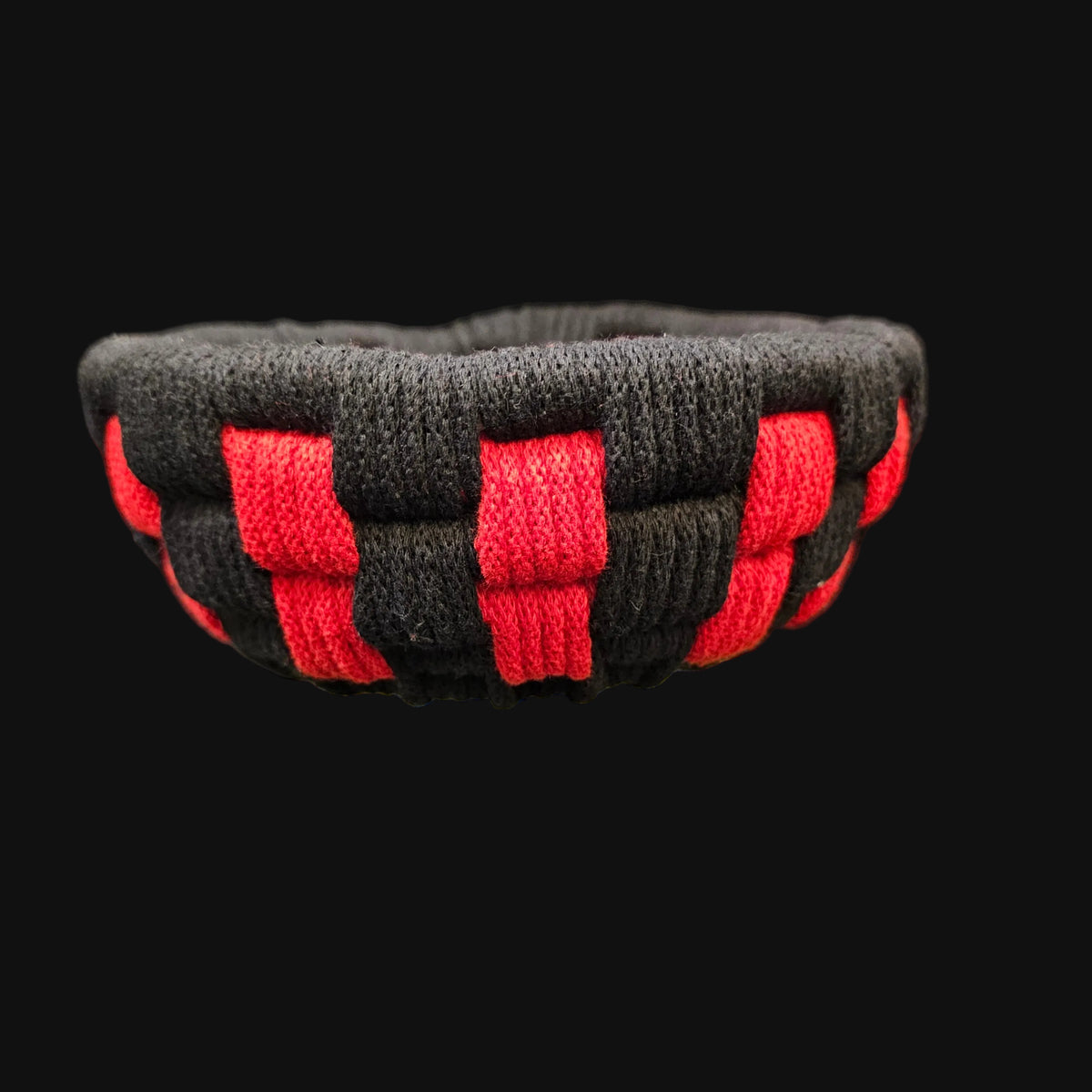 A simple black and red coiled basket . 7x7x3 inches overall