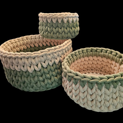 Three chunky knit cord storage baskets in sage green and cream.  Small 7x7x4; Medium 9x9x5; Large 12x12x6