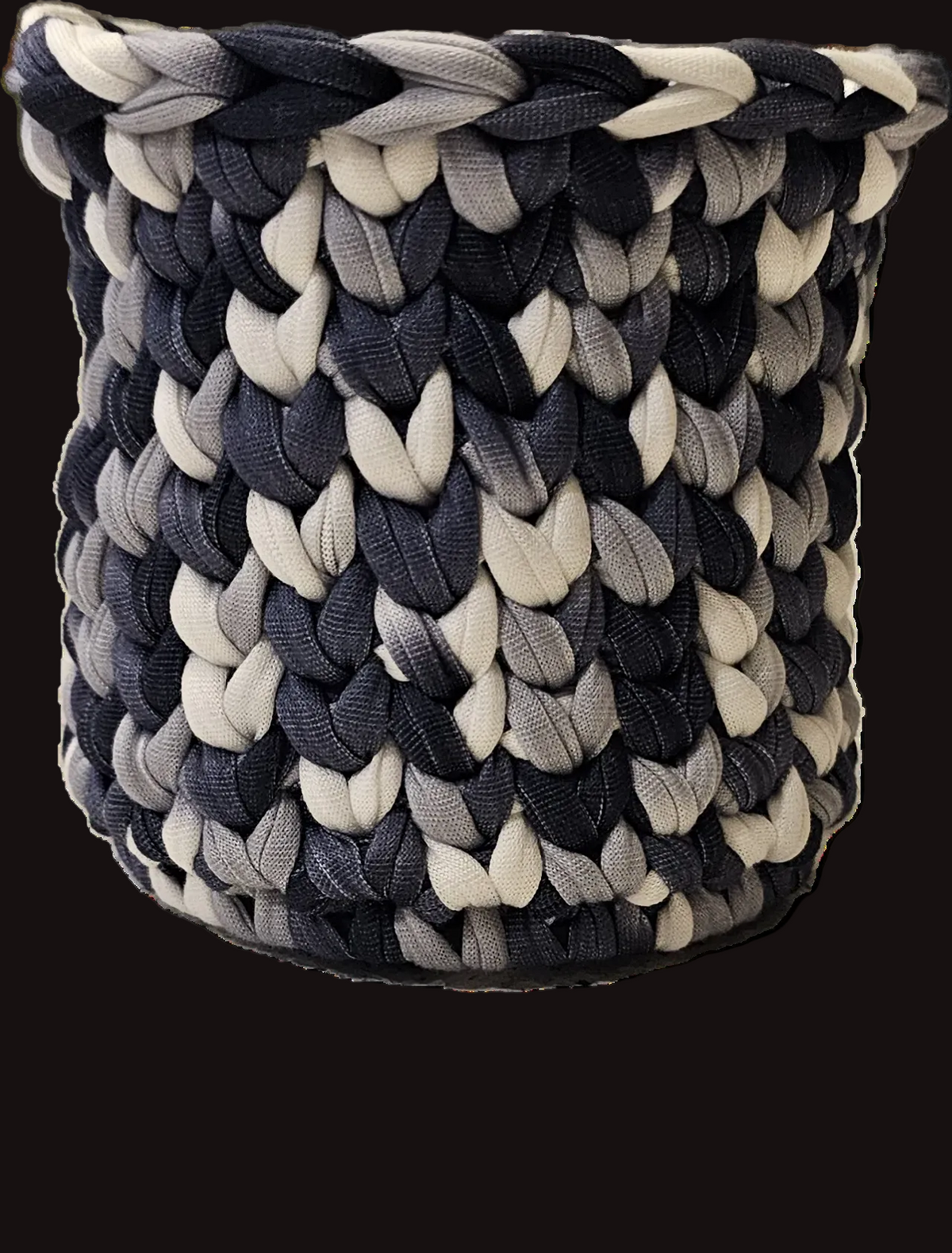 A simple crocheted basket in a color-blocked pattern of black, charcoal gray, and white t-shirt yarn. Perfect for pens/pencils or a small potted plant.