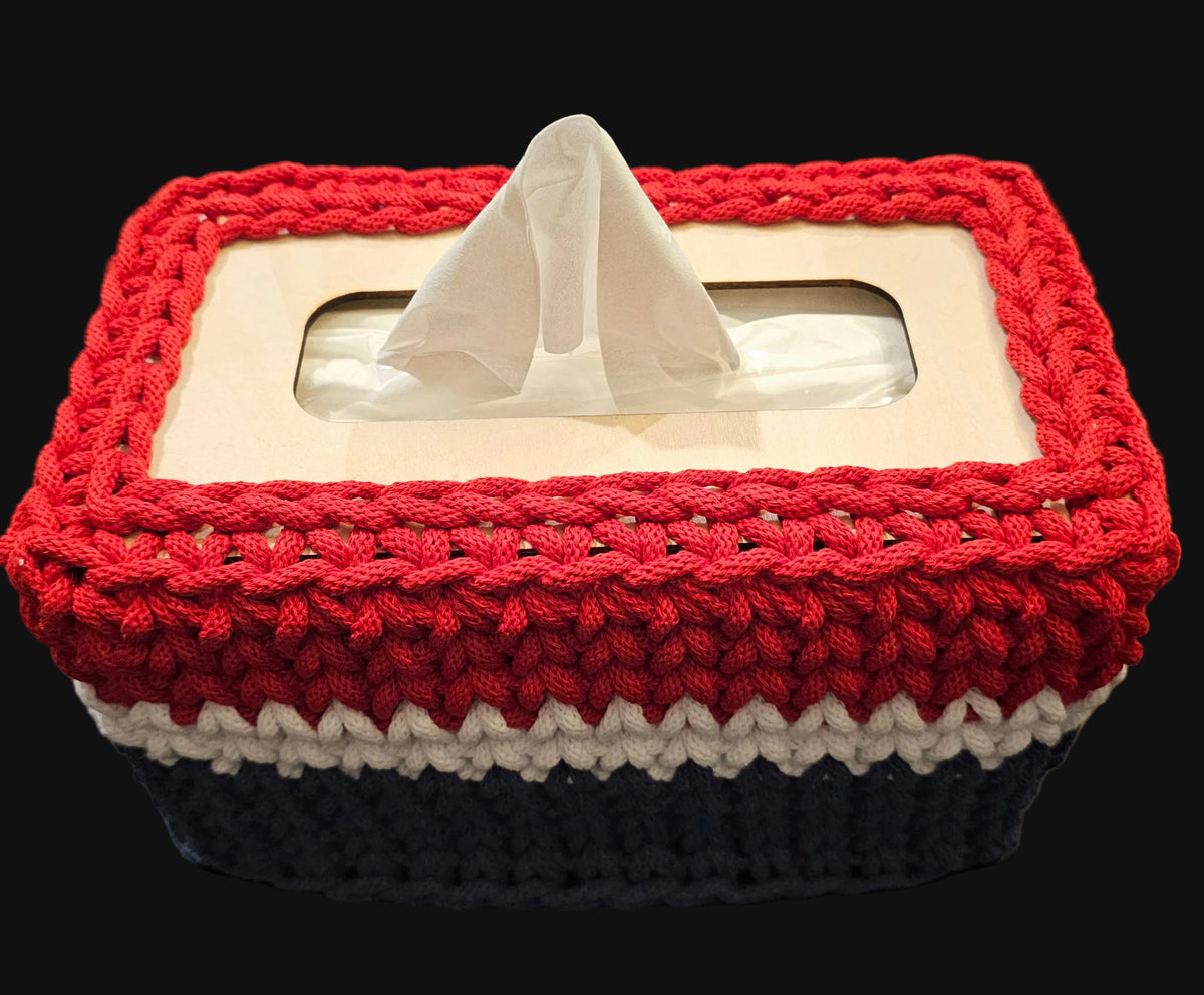 A rectangular crocheted tissue box cover in red, white, and blue stripes. 10x5x5 inches overall