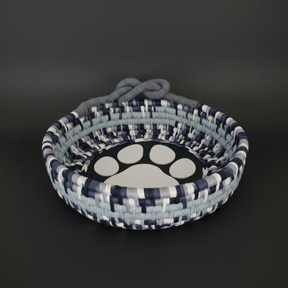 Extra-large coiled basket in shades of gray with a decorative looped handle